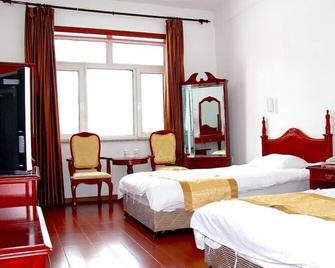 Yabuli Olympic Club Hotel - Mudanjiang - Slaapkamer