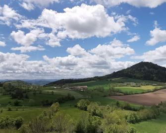 Family cottage with yard, ping-pong, near Lyon and Clermont-Ferrand - Retournac - Bedroom