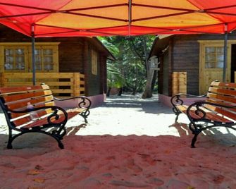 Wooden cottages on the beach - Vengurla - Patio