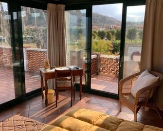 Villa Mirella Beach - Bungalow, Terrasse, Meerblick - Marina Palmense - Sala de estar