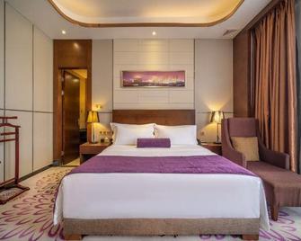 Relteem Hotel - จงซาน - ห้องนอน