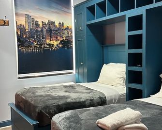 Essence Hotel - ברוקלין - חדר שינה