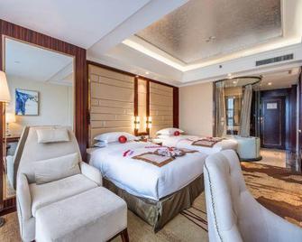 Xingzhou International Hotel - Hanzhong - Bedroom