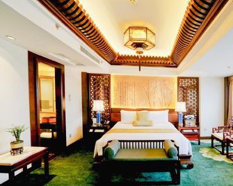 Shan Dong Hotel - ז'ינאן - חדר שינה