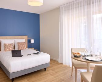 Quality Aparthotel Voiron - Voiron - Schlafzimmer