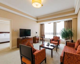 Jiujiang S&N International Hotel - Jiujiang - Living room