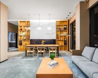 Country Inn & Suite by Radisson, Nanchang Tengwangge Wanshou Palace Subway Station - Nanchang - Living room