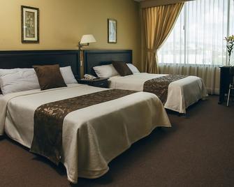 Hotel Podocarpus - Loja - Slaapkamer