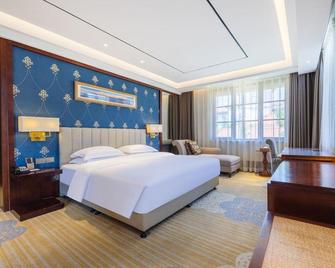 Jiulongsheng Hotel - Weihai - Makuuhuone