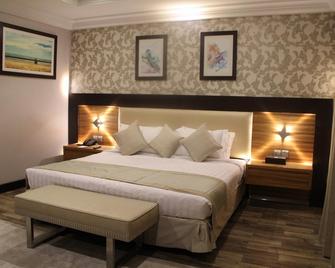 Rawda Suites Hotel - Jeddah - Bedroom