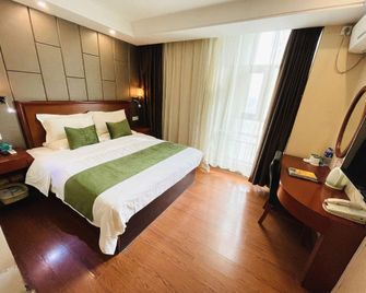 Greentree Inn Haozhou Xiyi Avenue Beichen Business Hotel - Bozhou - Bedroom