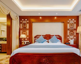 Adange Hotel - Lijiang - Bedroom