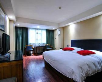 Shunfeng 123 Business Hotel - Shaoyang - Bedroom