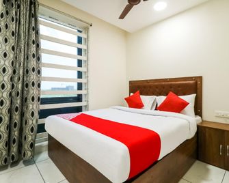 Hotel O Ganesh Mahalakmi Inn - Guntūr - Bedroom