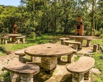 Villa das Palmeiras Chalés & Camping - São Bento do Sapucaí - Patio