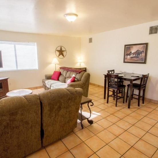 Living room view of Stagecoach Suites