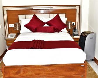 Empolos Hotel Nakuru - Nakuru - Schlafzimmer
