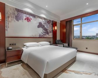 Ao Hua International Hotel - Xiangfan - Slaapkamer