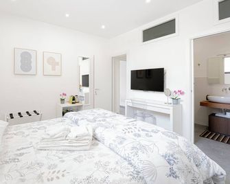 Eos - Elegants Apartments & Suites - Syrakusa - Sovrum