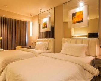 Jinjiang Metropolo Hotel - Qingdao Chengyang District Government - Qingdao - Bedroom