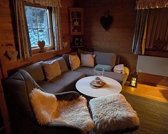 Exclusive alpine house in a prime location - Falkert - Living room