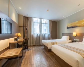 Home Inn Plus Changzhou Dinosaur Park Wanda Plaza - Changzhou - Camera da letto