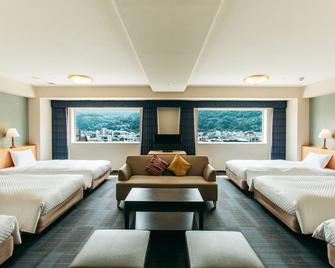 Kamenoi Hotel Beppu - Beppu - Bedroom