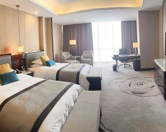 Dongsheng Hongfu Hotel - Changji - Bedroom