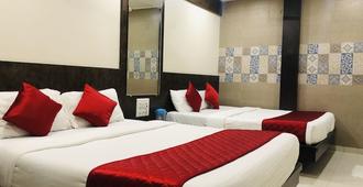 旅客住宅賓館飯店 - 孟買 - 臥室