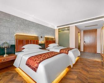 James Joyce Coffetel Hotel (Qinhuangdao Development Zone Yanshan University) - Qinhuangdao - Schlafzimmer