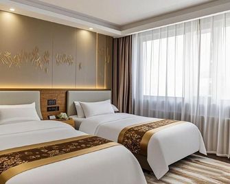 Beiguo Zhichun Business Hotel - Hulunbuir - Bedroom