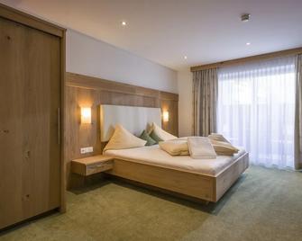 Alpenhof Hotel Garni Suprême - Zell am Ziller - Bedroom