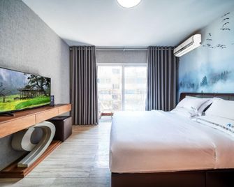 Good World Apartment (Guangzhou Cancer Hospital Taojin Metro Station) - Cantón - Habitación
