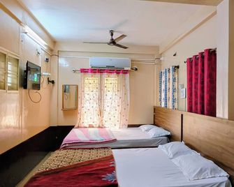 Kaveri Deluxe Lodge - Chikkaballapur - Bedroom