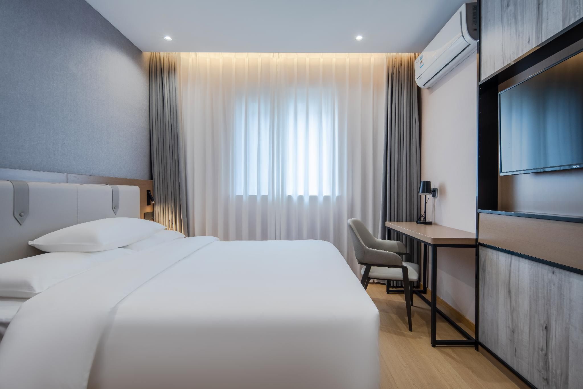 Elan Hotel Nanjing North Daqiao Road Red Sun Plaza - נאנז'ינג - חדר שינה
