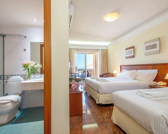 Porto Alegre Hotel - Galatás - Schlafzimmer