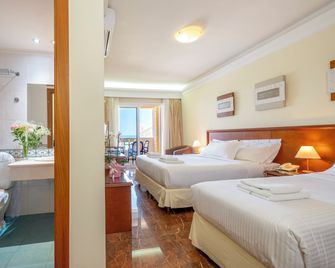 Porto Alegre Hotel - Galatás - Schlafzimmer
