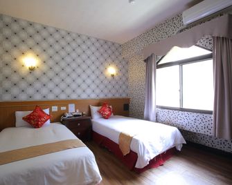 Chiayi Crown Hotel - Chiayi - Schlafzimmer