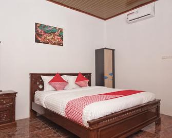 OYO 2410 Intan Hotel - Kutacane - Habitación