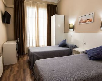 Hostal Lesseps - Bác-xê-lô-na - Phòng ngủ