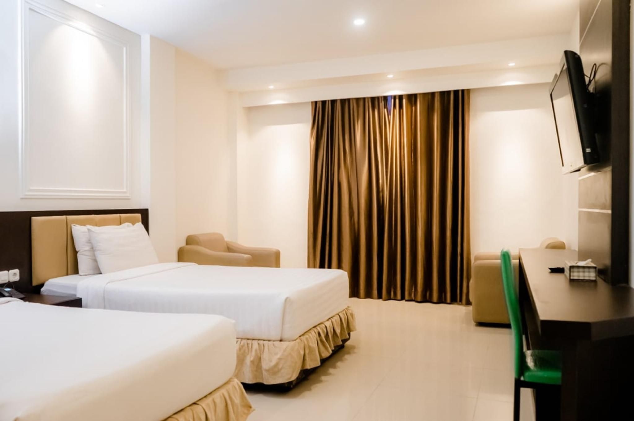 D'Blitz Hotel Kendari - Kendari - Schlafzimmer