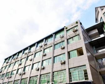 Home Pebble Motel (Mianyang Changhong international city) - Mianyang - Edificio