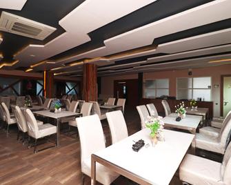 Hotel O Nirmalya Plaza - Brahmapur - Restaurant