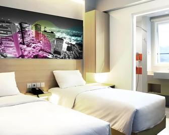 Cleo Hotel Jemursari Surabaya - Surabaya - Phòng ngủ
