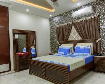 Patel Residency Guest House 2 - Karachi - Bedroom