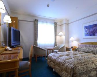 En City Hotel Nobeoka - Nobeoka - Bedroom