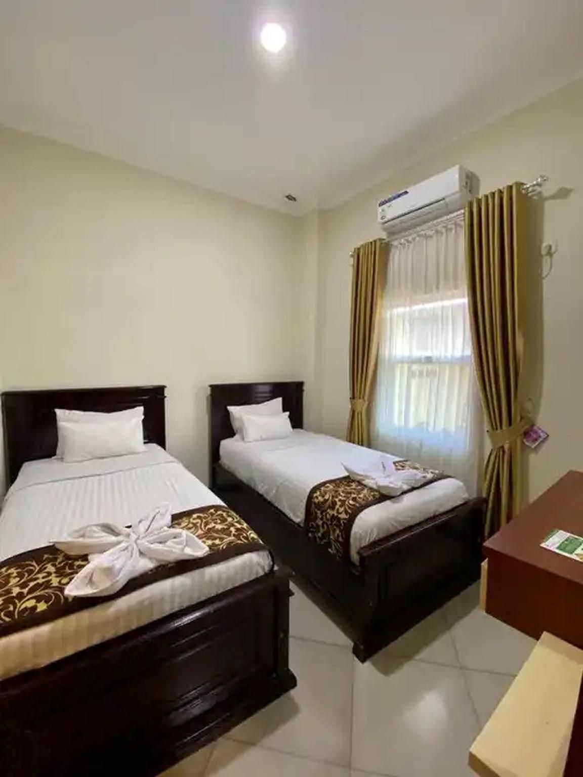 Qieran Hotel Syariah - Bengkulu - Chambre