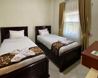 Qieran Hotel Syariah - Bengkulu - Chambre