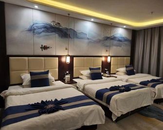 Hetian Huaya Hotel - Hotan - Camera da letto