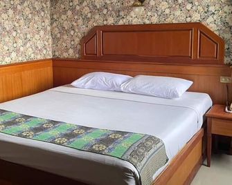 Sakol Grand Palace Hotel - Сакон Нахон - Спальня